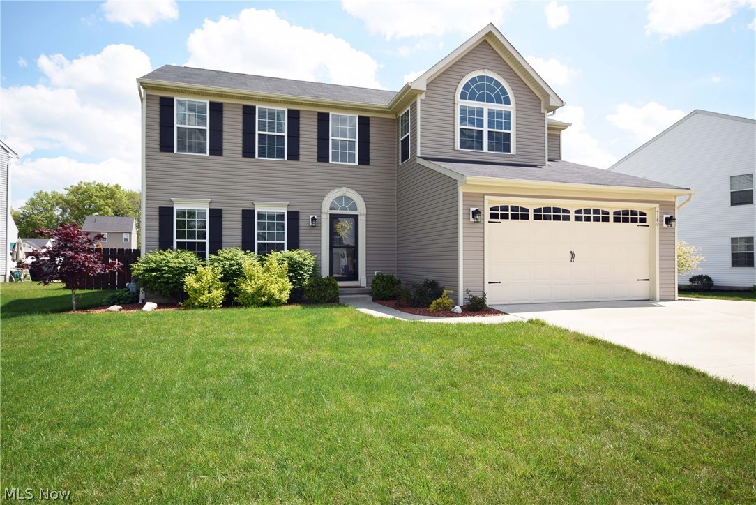 Beautiful updated 2-story with over 2500 sq ft plus finished basement. Large open floor plan with 9 foot ceilings throughout the 1st floor. 4 bedrooms, 3.5 baths, 1st floor laundry, open remodeled kitchen with all new appliances and attractive white concrete counter-tops. Kitchen is open to the great room and sunroom to the back which provides tons of natural light and great views of the backyard. All 4 bedrooms are on the second floor. Large master suite with vaulted ceilings, sitting area, large walk-in closet and updated private bathroom. Finished basement is great for recreation, parties, and just hanging out! Backyard is fenced-in, has a concrete patio, and creates comfortable outdoor living. 2-car garage with extra bump out for storage or workshop space and extra wide concrete parking space in the driveway. This place is gorgeous and has been infused with everything Pinterest! Don't wait until it's sold! Call and schedule your showing today!