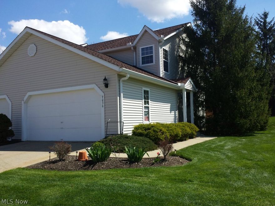 If you are looking for just a beautiful condo in move in condition then this is it. On the outside you will notice that this condo is an end unit which means extra peace and quiet. You also have a wood deck with total privacy and a large not so common area next door where you can frolic and enjoy a large green space doing whatever. This unit also has a bonus of a two car garage and a very close proximity to extra parking for your guest. Inside on the main floor you will see an open concept making the space feel very roomy and great for entertaining. When you walk up the floating staircase you will find both spacious bedrooms with cathedral ceilings. The full bath on this level is attached to the master bedroom with its own separate door which can be closed off for privacy. There is also another door on the bathroom which can be used by all others. The second bedrooms features a pair of corner windows allowing tons of natural light in making it feel cozy and welcoming. Downstairs in the