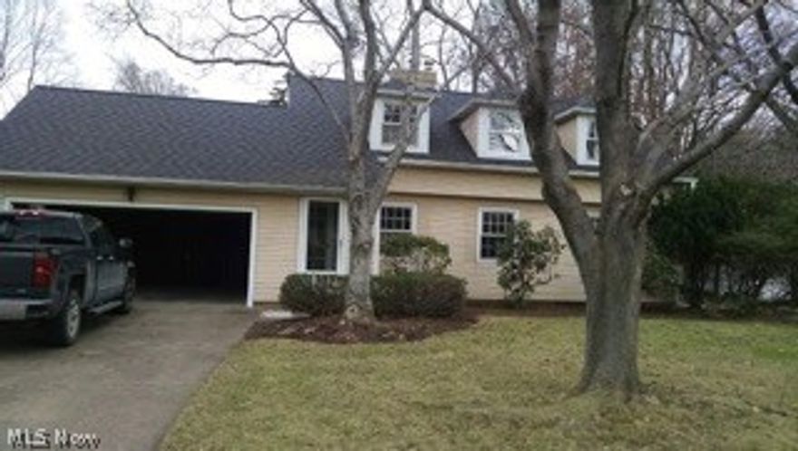 Quaint Cape Cod in Willoughby with 4 bedrooms, 2 1/2 baths and partially finished basement.