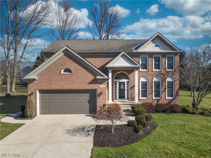 Welcome to this stunning four bedroom, two & a half bath colonial nestled on a cul-de-sac street in highly sought after Ethans Greens in Twinsburg! As you enter from the quiet street, you are greeted by a bright entry w/today's finishes throughout. The foyer features updated (2018) hardwood flrs. Flanked off foyer, the Living Room awaits w/newer (2022) carpet & expansive windows to allow the natural light to cascade in & is open to the dining area. Updated kitchen features quartz counters, huge center island, newer appliances, large eat-in area, & abundant cabinetry. Step down to the warm FR also w/newer carpet (2022) & cozy up by the fire. 1st flr is complete w/updated 1/2 BA. Stroll up to the primary BR w/vaulted ceiling & spectacular updated (2020) en-suite BA w/private toilet area. Soak away your stresses in the bathtub or in the oversized custom tile shower w/glass door. Expansive 2 sink vanity & spacious walk-in closet awaits you! Three add'l spacious BRs upstairs. Updated hallwa