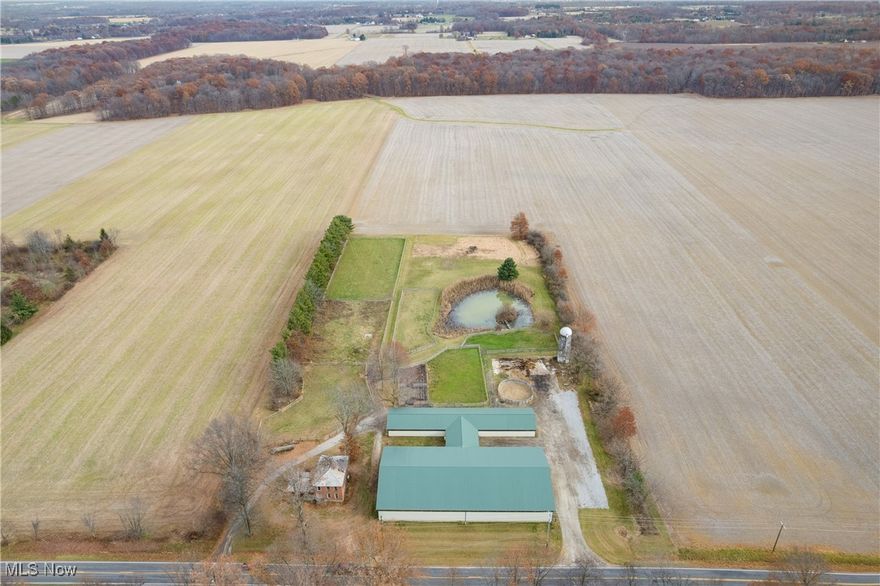 Welcome to this turn-key barn in Litchfield Township! Situated on 5.81 acres, this impressive facility features a 78' x 150' indoor arena and a well-equipped barn with 22- 10' x 10' stalls, one 8' x 10' stall, and one 12' x 10' stall in the main barn. Additionally, there are four temporary 10' x 10' stalls, one 10' x 11' stall, and an 11' x 11' temporary stalls located in the arena.

The barn offers a hot/cold wash rack, concrete floors, matted stalls, and 26 tack lockers equipped with bridle and saddle racks. A dedicated viewing room provides a comfortable space for lesson programs for spectators to watch activities in the indoor arena.

Outdoors, you'll find two 34' x 32' all-weather paddocks, a round-pen arena, and five pastures, including one that is prepped for the construction of an outdoor arena.

This property is full of potential! Use the barn for car or boat storage, continue operating it as an equestrian facility, or explore countless other possibilities. Bring your vision to life!