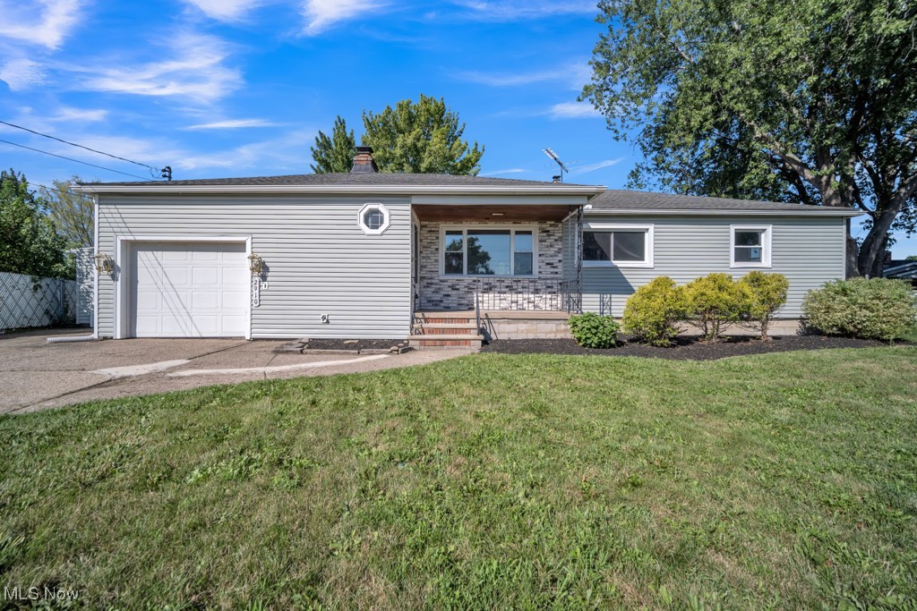 ALMOST LIKE NEW! This incredible 3 bdrm ranch has been completely renovated from the ground up! Walk through the foyer with shoe and coat storage and into the beautiful living room featuring a brick fireplace in the large open living room. The oversized picture window lets in tons of natural light as it overlooks the neighborhood. The kitchen has been updated with new flooring, paint, and stainless steel appliances! You'll be amazed at the extra storage you'll find in the mud room that leads to the ENORMOUS fully fenced in back yard! Oh! Did I mention the oversized 2.5 car garage!?!? On the way to the basement, you'll pass the door that leads to that huge garage, but wait, keep reading! The fully finished basement is ready to enrich the lives of the next owner! Dream up your own theater, game room, family room, craft room- or all of it! Its big enough, trust me! The bedrooms all have new carpet, the bathroom has been updated with new vanity and flooring. New furnace, AC and H2O tank in 2024, some new windows, all new screens, new sliding back door leads to the wooden deck! Just come see for yourself, this house is as much space for growing.
