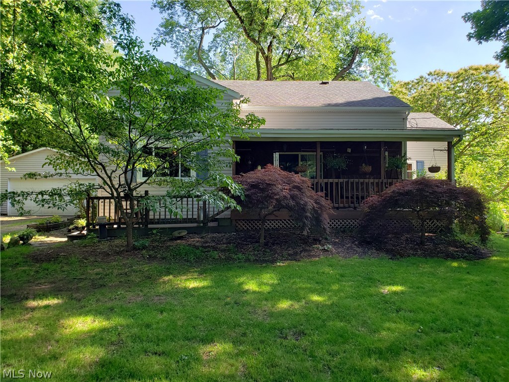 Welcome home to this serene, peaceful ranch home with gorgeous treed views!!! A wonderful tranquil 1.4 acre property located at the end of a dead end street and nestled against over 100 acres of woods! Still close to the amenities, shopping, dining, parks with fast highway access too! Enjoy 3 bedrooms (with possible 4th bedroom on the lower level), 1.5 bathrooms, 1316 sf on the main level with additional recreation room and office/bedroom/craft room on the lower level. Lower level walks out to a large patio! Super-sized, extra deep garage! Listen to the waterfall coi ponds from your fantastic covered front porch! All new windows 2019!! New roof 2018!! Refinished hard wood flooring! Plenty of storage throughout! Located in Coventry Township! Exterior just freshly power-washed! Major work here is done! Hurry, this beauty won't last!!