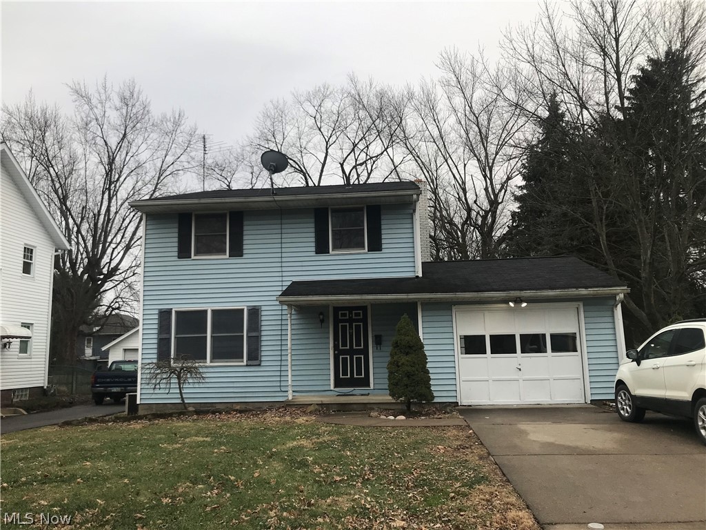 Welcome to 1924 Washington Blvd: This home is waiting for its new family! Featuring new carpeting in the main living area, upstairs hall, steps and 1 bedroom. The rest of the carpet has been steam cleaned. Kitchen cabinets have been painted along with the countertops. Newer Fridge and Dishwasher and Microwave will stay. Front room can be a at home office or formal dining room. it has glass paneled doors that slide open and closed. 1st Floor also features 1/2 bath. Large brick fireplace with built in shelfs to the right of kitchen. Nice size living room leads to newly painted porch/ patio. Private backyard, partially fenced in. Upstairs features 3 large bedrooms. Great closet space. Master includes double closets. Vanity area and a Master Bath. Finished lower area makes great family room. 2 separate rooms for laundry room and storage. Corner lot. Great location. Plain Local Schools!