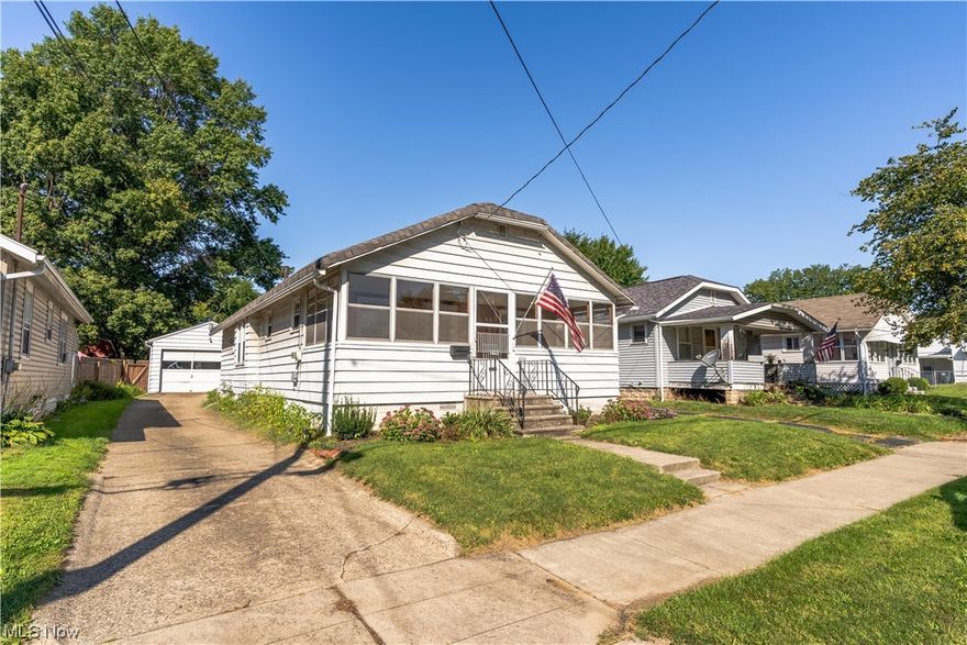 Affordable home ownership or an investment opportunity awaits in this charming ranch style home! Welcoming (23 x 7) Enclosed Front Porch invites you in. Enter into the Living Room with decorative fireplace. Open to the large formal Dining Room with lots of natural light. Big Kitchen offers ample counterspace and cabinetry along with a pantry. Kitchen also features a cute and cozy Breakfast Nook! 2 Bedrooms with nice hardwood floors! Full Bath features tub/shower combo and deep linen closet. Full Basement offers laundry area with stationary tub and plenty of storage. Back door leads to covered back patio perfect for outdoor relaxing! Spacious (21 x 15) detached garage allows room for additional storage! Updates include: H2O Tank approx 2018. Furnace & Central Air approx 2008. Windows approx 2007. Roof approx 2007. Convenient Location - close proximity to highway access and other amenities. Come check out all this home has to offer!