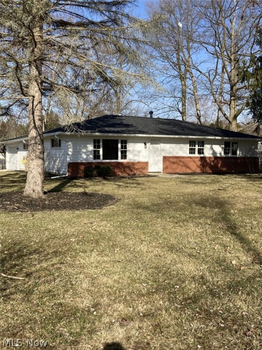 NEW:GUTTERS,INTERIOR PAINTING,BATHS,ROOF,KITCHEN CABINETS WITH GRANIT COUNTER TOPS,CARPETING,FLOORING,DISHWASHER,REFRIGERATOR,STOVE,ELECTRICAL BOX,FURNACE,HOT WATER TANK,GARAGE DOOR OPENER,MICROWAVE AND NEWER REPLACEMENT WINDOWS.CORNER LOT.