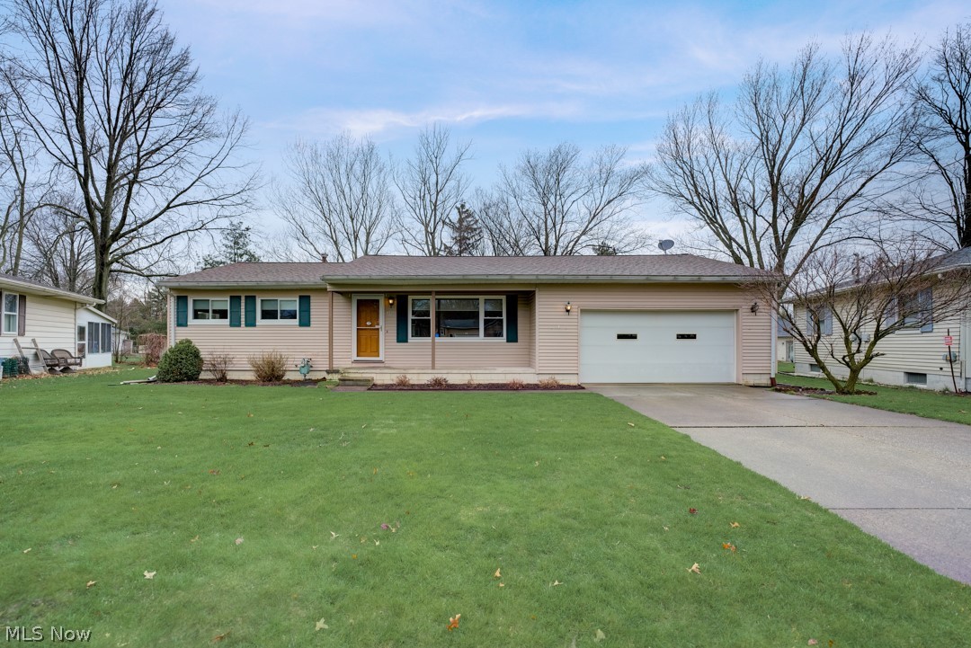 This Medina one-story home offers a patio, and a two-car garage.
