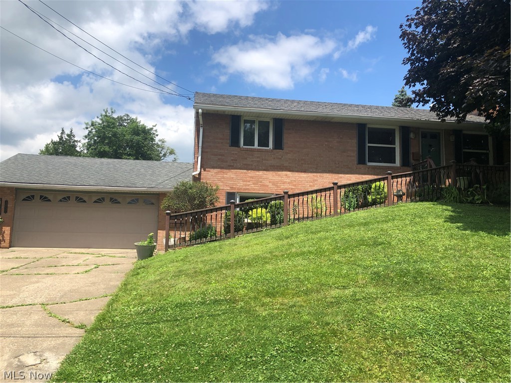 Welcome to this well maintained all brick raised ranch located on a quiet street. Many updates throughout including newer furnace, central air, roof, and hot water heater. Over 2000 sq.ft. with two wood burning fireplaces, four bedrooms and two full baths. Hardwood floors under carpet. The lower level features an in-law suite with bedroom, bathroom, and living room with fireplace and fully appliance kitchen. This space could also be used as rental income. Sun room and two car, over sized attached garage. Plain Local School District and one year home warranty included.