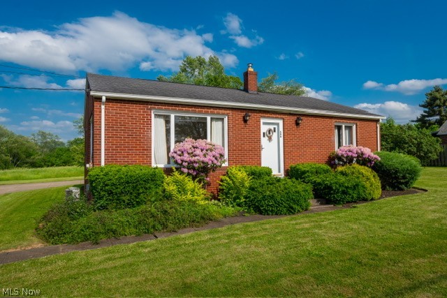 Welcome to this immaculate two-bedroom brick Ranch nestled on 4.3 acres of serene landscape. This charming home features a spacious bathroom, a full basement, and a two-car brick garage with an opener, offering both convenience and functionality. Step inside to discover new vinyl and laminate flooring in the hallway, bathroom, and 2nd bedroom, creating a modern and easy-to-maintain interior. Brand New Carpeting in the Living Room and the Primary Bedroom.The large, inviting kitchen is perfect for gatherings, while the generous living room boasts ample natural light streaming in through its big windows. With newer furnace, air conditioning, and water softener installed within the last few years, this home offers both comfort and peace of mind. Don't miss the opportunity to make this your own slice of paradise. Schedule a viewing today! The acreage behind the house consists of a LARGE Meadow that is surrounded by large trees on the outer edge of the meadow. Excellent for horses, or other livestock... Or just simply for building your dream garage or pole barn for your hobbies!