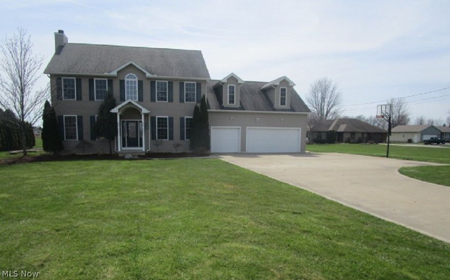 This is a HomePath property. Country living in this beautiful colonial in Elyria. Midview schools! Wood floors throughout! 2-story foyer entry. Formal living room. Open family room with fireplace flows into dining area. Gourmet-style kitchen with black granite counters, tiled back splash, breakfast bar, pantry closet and tons of cabinets! Laundry room with sink. Attached 3-car garage. Full basement is waterproofed. Spacious bedrooms upstairs. Master has deep walk-in closet and en suite with corner tub and separate shower. Huge lot on over 2 acres! Do not miss out on this beauty!