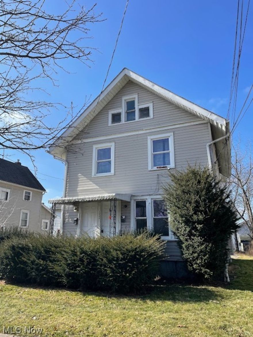 Attention Investors! Up and down duplex. Upper unit is occupied on a MTM lease and the downstairs unit is vacant.  Full basement.  Selling as is, owner will not make any repairs. Cash offer preferred. Tenants pay gas and electric. Three car detached garage.