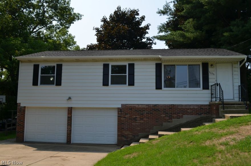 Freshly painted and ready to move into one floor living at it's best!  3 bedroom Ranch with newer roof and carpet.  Large fenced rear yard with deck.  Finished lower walk-out lower level and attached two car garage.  Spacious kitchen with eating area.  Move in and enjoy!