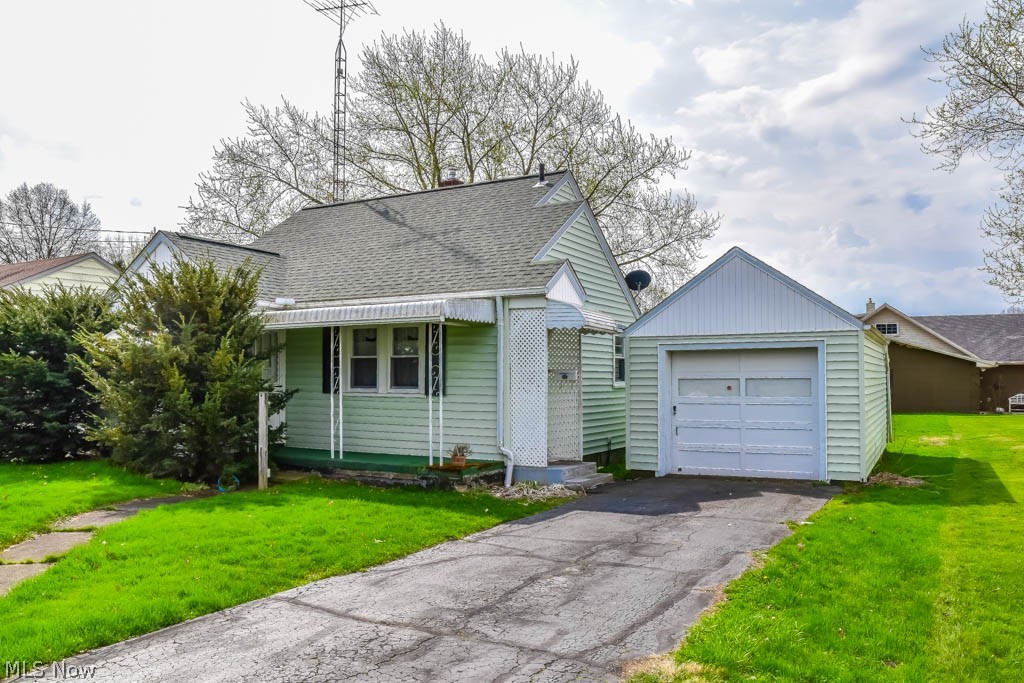 Easy to maintain 2 bedroom, 1 full bath ranch with a good sized backyard and a 1-car detached garage! Enjoy hardwood floors throughout the living room, hallway and both bedrooms. Whip up your favorite recipe in the eat-in kitchen applianced with a refrigerator, oven and range. Fantastic storage in the full basement plus a toilet and shower. Updated roof, furnace and A/C in 2013! Outside, there’s a covered front porch and a cleared, flat backyard. Convenient location near the football stadium! Schedule a private showing today!