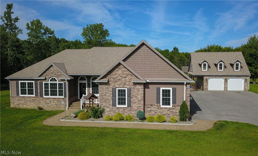 This personal oasis has it all! 6+ acres, 1/3 woods, 22' deep stocked pond w/ beach, 24x24 pavilion w/ electricity & water, well with free gas that runs the entire home & whole house gas generator. City water & new septic in 2014! 20'x40' in-ground salt water pool, 3' - 5-1/2' deep surrounded by a stamped concrete patio w/ a French drain system, chain link fence & 2nd pavilion (screened with electricity). 2-car detached garage also serves as an additional living suite, pool house, in-law or teen suite with its own separate heating, cooling & hot water tank, full bath plus a living space above. Have we even begun to talk about the house?! This beautiful ranch home offers formal dining, office, vaulted living room w/ etched glass on each side of the gas fire place and herringbone pattern wood look tile. Left wing includes a full shared bath, 2 generous size bedrooms (one of which leads you to the hot tub room with its own separate heating, cooling and dehumidifier). Custom cabinetry is featured in the eat in kitchen w/ a breakfast nook, oversized bar, plenty of counter space & stainless-steel appliances. Large master bedroom w/ sitting area, door to the back patio, master bathroom w/ double sinks, sauna shower, double shower heads & adjoining laundry complete the 1st floor. For the grand finale you have a half bath as well as 2800 finished sq ft of lower living space w/ a ramp walk out into the 3-car garage. Phew! What an amazing value! Call to schedule your private viewing!