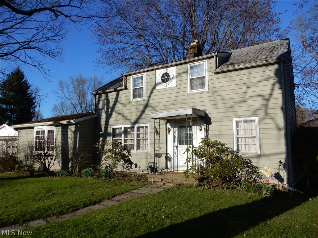 Own a part of Beach City History in this solid built cape. This property offers an over-sized double lot with tons of potential. Inside, you will find that the living space flows very nicely and has an abundance of possibility. The large living room has a very nice brick fireplace. Off the living room, there is a huge main floor master bedroom, showcasing 2 large closets and leads to the large master bath. You will appreciate having the laundry room located conveniently on the main floor. Up stairs, there are 2 sizable bedrooms and a full bath. The This charming home is priced to sell. The electric, furnace and water heater are updated. Contact me for your private showing.