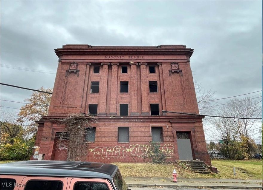 Step inside a piece of Cleveland history — the Newburgh Masonic Temple, built in 1917 by architect William J. Carter. Once the proud gathering place of the Masons for over 50 years, this three-story brick landmark hosted meetings, ceremonies, and community life before closing its doors in 1984 .

Today, the temple stands as a striking reminder of the past, bearing ornate design details, towering brick walls, and stories hidden in every corner. While the property is currently condemned and in need of a full rehabilitation, its future possibilities are endless. With city support for adaptive reuse, this historic structure could be transformed into climate-controlled storage, artist studios, a cultural or community center, loft-style apartments, or an event space.

Exterior modifications are restricted under its historic designation, but creative redevelopment of the interior can breathe new life into this rare Cleveland landmark. Whether you are an investor, preservationist, or visionary, the Newburgh Masonic Temple presents a one-of-a-kind opportunity to reimagine history while shaping the future. Access by appt and at buyer’s risk; follow City requirements. Docs in MLS. Seller financing considered for the right offer.