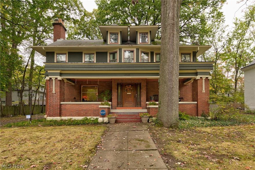 Classic Coventry Village Brick Front Porch Colonial! Spacious & grand throughout with over 2500 sqft of living space not including the versatile third floor.  Original Architectural Details throughout including original woodwork with natural finish, leaded glass windows, crown molding, pocket doors, built in china cabinets, arched windows & an original Butlers Pantry. Living Room with wood burning Fireplace opens to a 12x7 covered side porch through a lovely glass pane door. Gorgeous formal Dining Room with tall baseboards, high ceilings & bay side window with leaded glass lintens & a large picture window in front. 3 bedrooms and a full bath on the second floor. Terrific 3rd Floor Suite could easily be a Master Suite & has a remodeled bathroom & a huge unfinished storage space with dormer windows. Recent updates include new boiler in approx 2012, roof in approx 2000 & a hot water tank. The back yard is fully fenced & there's a patio in the rear. Nice 2 car detached garage that is newer