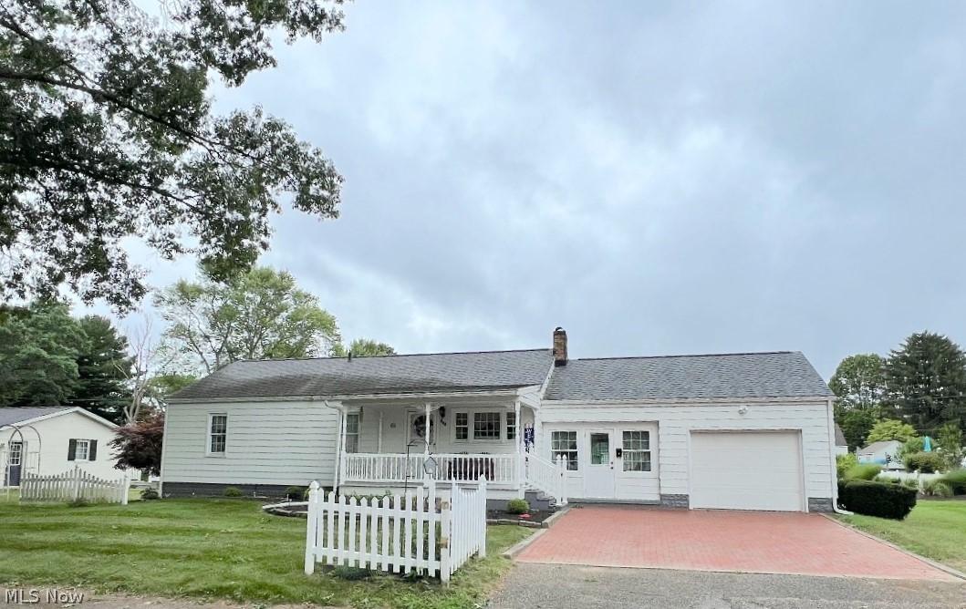 Beautifully maintained ranch home in a great country-like location in town. This 2-3 bedroom, 1 1/2 bath home has a first floor laundry room and is situated on a level 120x149 lot in a quiet neighborhood. There is an over-sized 1 car attached garage plus a 14x20 storage barn. The kitchen has Shrock cabinets and includes all the appliances. There is a family room with a gas fireplace. The main bath has a bathtub and a separate double shower. The dining room could also work as a 3rd bedroom. There are hardwood floors under all the carpet. The full walk out basement has a kitchenette and a shower. There is a nice covered front porch and a back deck. The roof was replaced in 2016, there is a brand-new hot water tank, updated vinyl windows, 200 amp electric, and a high efficiency gas furnace and central air.