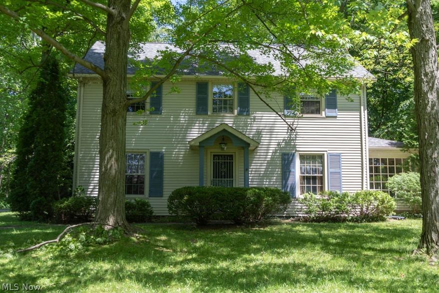 Stately 4 bedroom Boardman colonial situated in a beautiful parklike setting. The front door leads in to a center hall flanked by the formal dining room and oversized living room with fireplace and side sunroom. The eat-in kitchen has ceramic floors and a large picture window in the eating area. First floor 1/2 bath and access to 2 car attached garage. Hardwood floors, fresh paint and crown moldings run throughout the home. The second floor features 4 large bedrooms, full bath and plenty of closet space. Full basement. Beautiful yard is wooded and private with a brick back patio, side porch, 2 sheds and room to play. Home warranty included for worry free purchase! Call today!