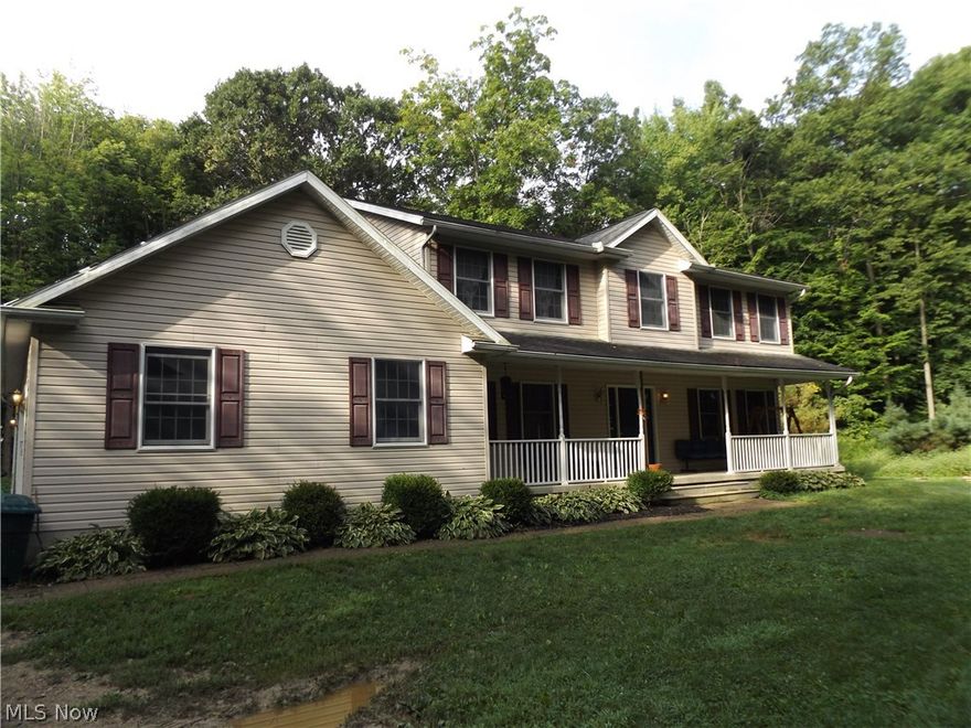 Drive down this park like driveway as it opens up to a beautiful lot of privacy, With this park like setting all around, you will love sitting on the huge front porch as you enjoy the sounds and sights of the seasons. This home has lots of room to move and grow. The first floor laundry room leaves lots of space to be doubled as an office or sewing room, etc, use your imagination. The unfinished Basement has it's own entrance from garage is plumbed and ready to add another full bathroom (grinder pump all ready installed and never used) and Kitchenette/wet bar etc. Perfect for an in law sweet. Another added feature to this home is the out side water supply; One spicket suppled by county water while the other is connected to it's own well supply and strictly for out side use. Stop by today this home won't last long.
