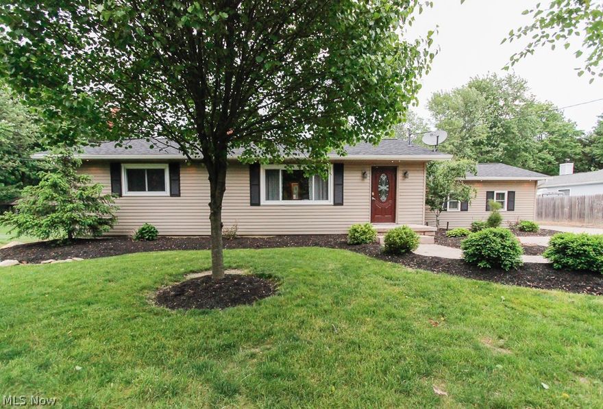 Welcome home to this updated 4 bedroom ranch with improvements and updates throughout.Freshly mulched and landscaped . Large yard and 32x40 outbuilding with 220 electrical. Possibilities are endless with the open floor plan. Gorgeous Master retreat with newly remodeled master glamour bath with large jetted tub, stand up shower with multiple shower heads and rain head . Plenty of storage in the master walk in closet. Waterproofing and new drain tiles. Basement is a great family room and playroom with stone wood burning fireplace. Extra wide drive with stamped concrete walk way.New doors and trim throughout home. New H20 tank, new roof , gutters and siding 2013. Priced to Sell! Call for your appt today.