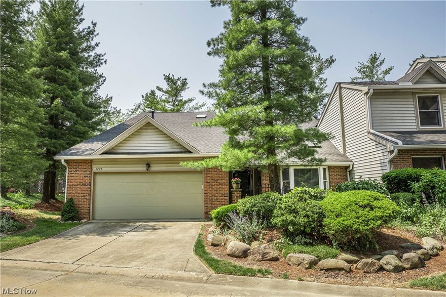 This place is a showstopper! You won't want to miss this bright, beautiful and professionally remodeled condo in Indian Hills!  The large kitchen comes complete with granite counters, stainless appliances, a breakfast room, walk in pantry, breakfast bar and wet bar.  The open concept main level offers plenty of living space and natural light. The fireplace wall has been completely redone and it enhances the entire space beautifully.  There is access to a large, Trex deck from both the great room and master bedroom.  The deck provides both privacy as well as great views of the water. The master bedroom and adjacent glamour bath are very nicely appointed. Upstairs two large bedrooms and full bathroom round out the package. There is ample storage throughout. These owners have invested in beautiful, professional grade finishes and materials throughout, and it shows!