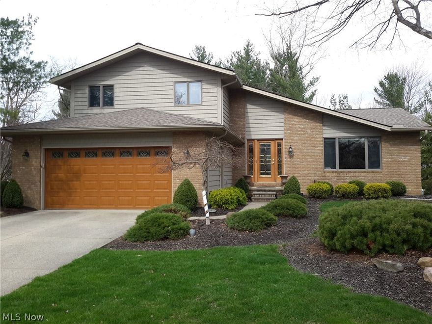 Absolutely Immaculate 4 Bedroom 2.5 Bath Split Level Home On A Spectacular Cul-D-Sac Wooded Lot With Lake Views In Desirable Pine Lakes Subdivision*This Open And Airy Home Offers Ceramic Tile Floors In Large 2 Story Foyer, Eat-IN Kitchen, And Upstairs Bathrooms*Kitchen Has Corian Counter Tops, Pantry, Skylight, And Slider To Gorgeous 2 Tier Private Deck With Built-In Benches And Planters, Viewing Park Like Yard, Green Belt Area And Walking Trail*Family Room Has Gas Fireplace And Slider To Deck*Bright Spacious Living Room And Formal Dining Room*Fourth First Floor Bedroom Off Family Room*Curved Staircase Leads To Master Bedroom, Master Bath With Skylight,  Large Walk-in Closet, And Hallway Bath With Skylight Shared By Two Bedrooms*Lower Level With Outstanding Finished Recreation Room, Separate Office, Workshop Area, Vented Glass Block Windows*2 Car Attached Garage Has Miracle Stone Flooring, Drain, Clopay Garage Door With Leaded Glass Windows (2012), And Pull Down Stairs*Professional Lan