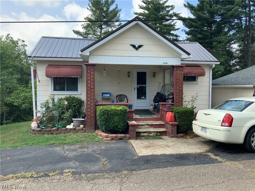 If you are looking for a great yard, this is the home.  The 2 bedroom home sits on a corner lot that is about a half acre with a variety of fruit and nut trees.  The seller has it partially fenced for her dog.  Basement has a finished room that could be a 3rd bedroom or family room.  Seller has started to put a 2nd bath in the basement, and all the materials are there for the new buyer to complete it.  Just minutes from Wheeling or St. Clairsville.  Why rent, when you can own for less.