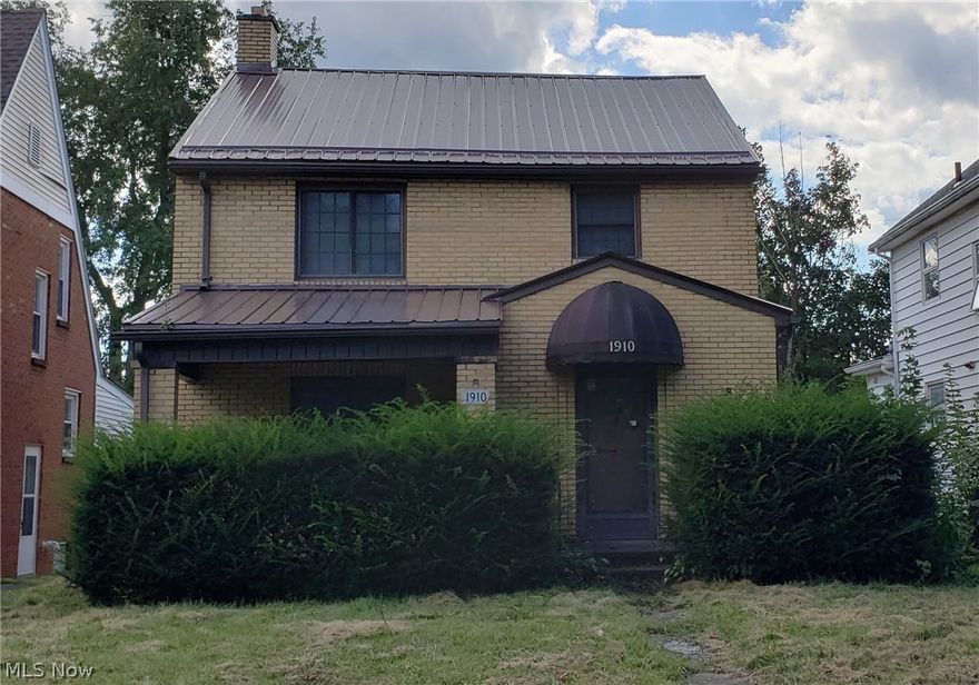 Very unique opportunity, this property includes a detached garage, newer metal roof, newer windows, hardwood floors and original wood trim throughout. Formal dining, Living room and kitchen on main level, second floor has three bedrooms and a full bath. Being sold as is.