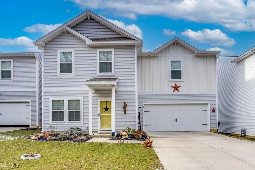 Beautiful newly constructed home (2022) located at the Crossings at Auld Farms! This charming home boasts 3 bedrooms, including a large master bedroom with a walk-in closet and a master bathroom. The first floor has a half bath for convenience with an open floor plan. This home has so much natural light making you feel right at home, bringing in all of the neutral colors of the flooring, paint, and cabinets. Other carefully thought-out upgrades are granite counters in the kitchen and subway tile in the bathroom showers, making this home stand out compared to some other models. A patio off the back door leads you to a fenced-in yard with a pergola, perfect for evening nights and relaxing or entertaining. This home offers peace of mind being built in 2022, and also, it comes with a tax abatement until 2037. Yearly real estate taxes are only $1,093 making this new home very affordable. All new LED kitchen appliances add an extra bonus. New ceiling fans and new dining room light, as well as a new screen door installed, and landscaping upgraded. Sidewalks make this area great for walks with your pup or just to take a stroll. Less than a half mile from the recently renovated Perkins Woods Pool that is open to the public during season, perfect place to cool off or hang out with friends. Close to Cleveland Clinic Akron General, Akron Children's Hospital, Summa, University of Akron, the Akron Zoo, and so much more. This home qualifies for a Zero-down FHA Loan and a First Time Buyer Mortgage Tax Credit Program. Reach out for more details. Don't wait to make this home your own.