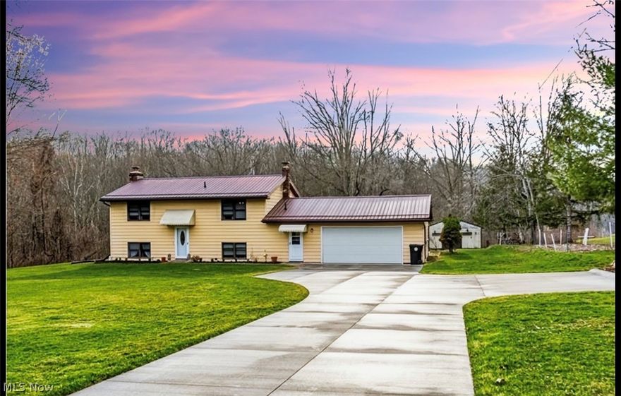 Welcome to this spacious 4-bedroom, 2-bath raised split-level home nestled on 3.3653 scenic acres in the heart of Ohio's wine country. Located in Geneva, with the majority of the property extending into Madison, this unique property offers the perfect blend of privacy, space, and opportunity.

The home features a versatile layout with four generously sized bedrooms and two full bathrooms, providing plenty of room for comfortable living. Throughout the home, you?ll find abundant storage options, making it easy to stay organized while maximizing every square foot of living space.

Step outside and enjoy the natural beauty of your surroundings. The property includes direct access to the Grand River, offering a peaceful setting for relaxing, fishing, or simply enjoying the outdoors. Directly across the road sits a local winery, and several other popular Ohio wineries are just minutes away, placing you right in the middle of one of the region's most desirable destinations.
For those who need extra space for hobbies, equipment, or projects, the property also features a 24' x 32' outbuilding, ideal for storage, a workshop, or recreational use.
With its prime location near wineries, river access, and generous acreage, this property offers incredible potential. Whether you're looking for a place to make your own private retreat or exploring the possibility of a short-term rental or Airbnb investment, this home is full of opportunity and ready for its next owner's vision. Some GPS systems may also indicate a road closure on S. County Line Road. The property is located before the closure, and the home is accessible from the directions listed. Please note that the road beyond the property is seasonally closed.