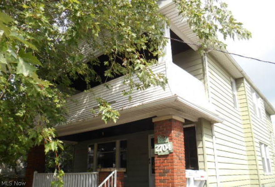 MUST SEE!! Great Opportunity, live in one unit and rent the other for extra income. Large 2 Family Colonial features 2 Bedrooms each unit.  Spacious Living Room with decorative fireplace and plenty of windows to allow the natural light in.  Formal Dining room with built in china cabinet and window seat.  Beautiful hard wood floors.  Both Kitchens have ample cabinetry and counter space with room for eat in areas.  Fenced in back yard, great for pets.  Back yard also features a large deck for entertaining guests and relaxing.  Charming area with lots of character.  Easy access to highways; 176 and 480. Schedule your showing Today and make this your home.