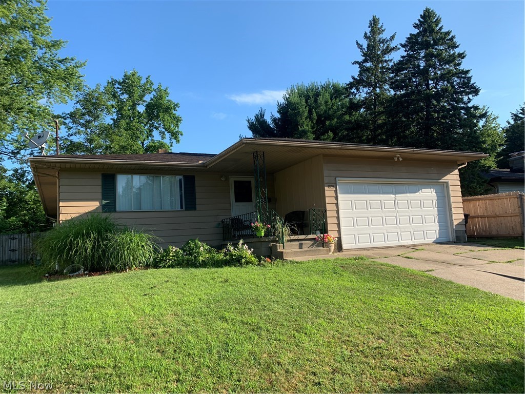 Fantastic Investment Opportunity! Enjoy instant equity and income with this spacious tenant occupied single family home. Huge living room flows into the large eat in kitchen with doors out to the fenced back yard! 3 nicely sized bedrooms all with good closet space, one with a Jack and Jill bathroom attached! Hallway bath boasts plenty of counter space as well. The tenants enjoy a partially finished basement rec room and bar area. Attached 2 car garage and convenient West Akron location! Updates include newer roof, hot water tank, as well as updated plumbing. Long term on time paying tenants are currently on a one year lease through July 2021 and would like to stay!