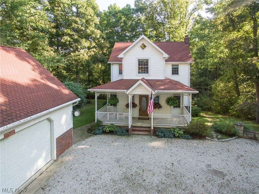 Enjoy the peaceful life of country living combined with quick access to the freeway to both Cleveland and Akron. This quintessential farmhouse  is truly one of a kind. The gourmet kitchen with Amish built hickory cabinets and granite island is wide open to the family room with gleaming hardwood floors and a cozy wood burning fireplace. A sun room with vaulted ceilings overlooks the back acreage of trees, trees, trees. So peaceful and private! A formal dining room, office, and full bath complete the main floor. Upstairs the master bedroom has a glamour bath with double sinks and walk-in closet. There are two additional, spacious bedrooms and another full bath on the second floor. The lower level is a walk-out with an enormous rec room and another finished area for additional office space or craft room, or this could be made into its own suite with another full bath with heated floors! The over sized 2.5 car garage is spacious and also is heated. This meticulously maintained home has a n