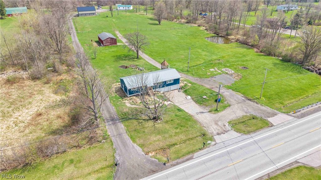 Photo of 11179 Madison Road, Huntsburg, OH 44046 (MLS # 5201768)
