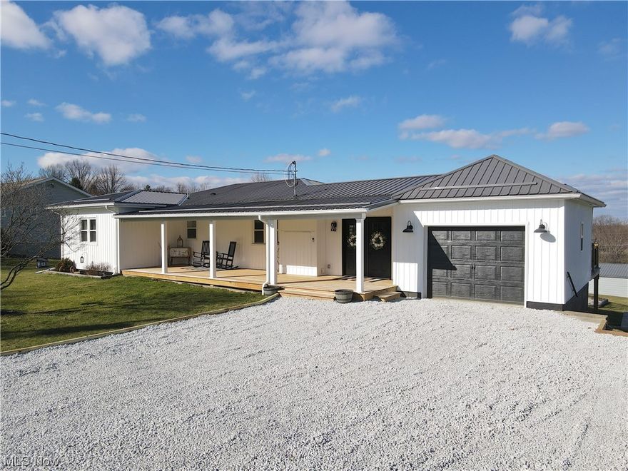 The transformation of this home is TV-worthy! The owners hate to leave their lovingly remodeled dream house with solid wood beams, shiplap walls, and custom details you won't find anywhere else. There's an open concept kitchen, living room and dining area that features a large fireplace set into custom made cabinetry that separates the living and dining sides. The creative use of storage is amazing throughout this home. The basement has been finished into a game room and rec room with bar, wine storage, and faux fireplace. Walk out the basement to a large back yard with pation, deck, fire pit, multiple storage buildings and a 24x32 work shop/RV garage or storage building. Enjoy the country air from the back deck or the covered farm house style front porch, both newly built. You won't want to miss this one!