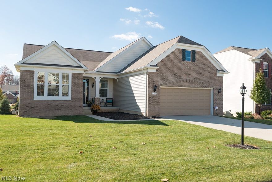 Stunning Strongsville ranch with 4 bedrooms and 3 baths! Built by Pulte only 4 years ago, this unique over 2500 sq ft Charleston custom floorplan combines style and function with its open layout. Gorgeous gourmet kitchen has stainless steel double ovens with cooktop and loads of counter space with its sprawling breakfast bar.  Large great room with fireplace allows for plenty of seating and an office allows a quiet work space. Wood floors flow through the main living areas. Bedrooms are all sized well and master bedroom has a walk- in closet and ensuite bath with double bowl sinks and 5’ shower. Downstairs, an unfinished basement with 9’ ceilings and garden windows gives an opportunity to expand. First floor laundry and extended garage add to the conveniences of this home. Don’t miss out on this amazing home. Come see today!