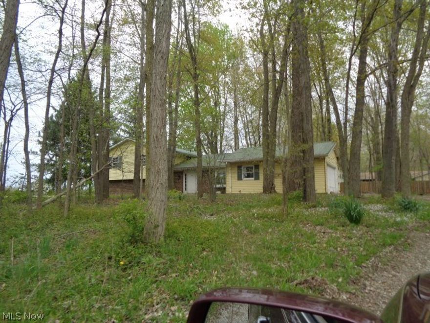 Four bedroom Split level home in a nice wooded area. Buyer
responsible for own due diligence, inquiry and verification of all property information, condition, square footage, tax, POS requirements
and parcel data. Broker is not liable or responsible to verify any information as all data in mls is reflective of public records. Buyers
recommended to investigate all data. Seller will not make repairs, property sold in as-is condition.