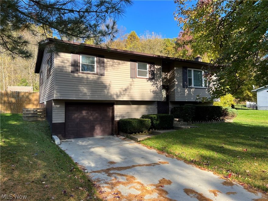 Move in ready!  3 bedroom, 1.5 bath vinyl sided home.  Neutral decor.  Oak kitchen with stainless steel appliances.  French doors in the dining room to the 22 X 10 & 14 X 10 tiered deck.  Private, fence enclosed back yard includes an 8 X 8 storage shed and 7 X 20 shed with 3 sets of double doors.  Lower level includes a laundry room and potential rec room.  Vinyl replacement windows in 2015+/-.  2 car attached garage with new paved driveway in 2020.  Taxes reflect the seller receiving a homestead credit of $344.66 annually.