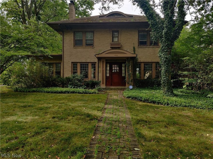 Check out this gorgeous brick colonial on a double lot in historic West Akron!  The interior of this home has all of it's original charm intact: 9 ft ceilings, arched doorways, original french doors, and hardwood flooring throughout.  The first floor has an inviting eat-in kitchen, large living room, great room, half bathroom, and a dining room plenty big enough to invite company over for dinner. Upstairs you will find 3 large bedrooms and a full bathroom.  Head outside to mature trees, open air patio, and wooden fenced in private yard.  Boiler 09', HW Tank 12'.  Don't let this one get away, schedule your private showing today!
