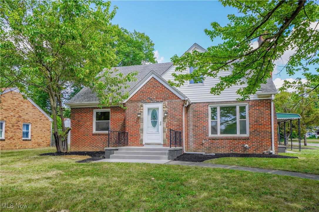 You’ll be pleasantly surprised by how much space this 4 bedroom West Akron cape cod has to offer. It’s larger than it looks, with a two car attached garage, two full baths, and a layout that feels just right. Step into the entry vestibule that opens to a comfortable living room with a fireplace, then flow into the dining room through charming arched doorways and enjoy the view from the picture window. The kitchen is nicely updated with butcher block counters, stainless steel appliances, and plenty of cabinet space. Two main level bedrooms have new carpet and share a modern full bath with a double sink vanity and tub shower. Upstairs, you’ll find two more bedrooms and a second full bath with a stall shower and built in linen storage in the hall. The full basement adds room for storage and laundry, while the covered patio off the garage is perfect for relaxing or hosting friends. The yard is easy to care for, and you’re just minutes from Buchtel CLC, Griffin Stadium, parks, shopping, and dining. Don’t miss this one, it’s a great place to call home.