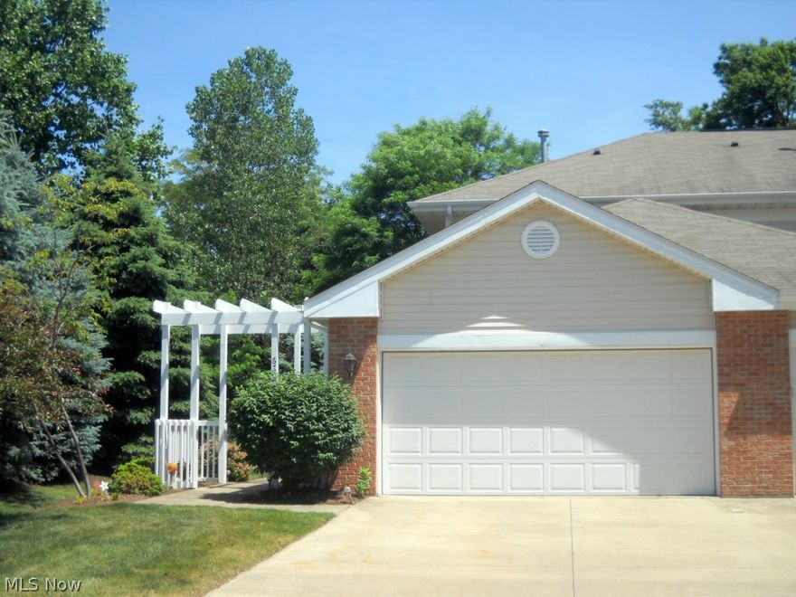 Exceptional End Unit with 2 Car Garage, Built in 2002.  Wood/Wood Laminate entire First Floor Leading to Private Patio and Extra Green space.  A Rare Find!  1240 Sq. ft., 1.5 Bath and 1st Floor Laundry.  All appliances Including Washer and Dryer Provided By Seller.  Home Warranty Also Provided by Seller!