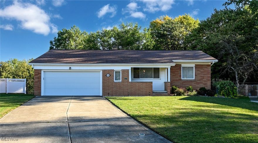This long-time owner has done some significant updates over the last few years making this home something special! Starting with the outside, this brick & vinyl Ranch has an outstanding fenced backyard with a custom Patio for entertaining. (Fence & Patio, approx 2 years old). The tear-off roof is 5 years old. Newer Garage door & opener about 2 years old. House has replacement vinyl windows. There are 3 Bedrooms & 2 full Baths. Custom 1st floor Bath was remodeled on 2007 and has double sinks, granite counter, jetted tub & tiled walls. All 3 Bedrooms plus Living Room have hardwood floors under carpet. A couple of steps down from the Living Room is the sharp island Kitchen, featuring cherry Kraftmaid cabinets, granite countertops, SS appliances & pantry. Remodeled in 2011 w/ new appliances in 2024. Finished Lower Level offers a spacious Rec Room, plus a full Bathroom. W&D stay as well as all Kitchen appliances. HW tank (2021). Super location off Broadview Rd, near West Creek Reservation (part of Cleveland Metroparks).