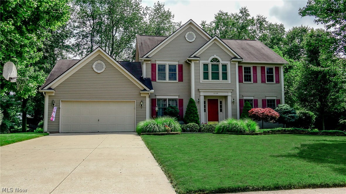 Gorgeous four bedroom colonial in the sought after Eastwicke Farms development! Beautifully landscaped yard with two level back patio professionally installed featuring Timbertech deck with Versa Lok wall and pavers on the lower level. Fenced in backyard is an added bonus as well as automated sprinkler system and landscape lights. Other updates include new high efficiency furnace, central air, hot water tank -2017 and replacement of second floor windows. Spacious foyer with hardwood flooring flows into formal dining room featuring tray ceiling, updated light fixture and neutral carpet/paint. Formal living room with french doors that lead to the large family room with gas fireplace & ornate windows. Updated kitchen includes white cabinetry, pantry, center island, eat in area, PLUS newer Pergo flooring and brand new light fixture! All appliances including washer and dryer STAY with the property! First floor office and laundry room too! This is a must see, schedule your private showin