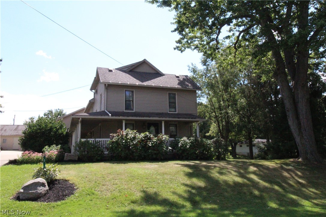 This is a unique property, all on approximately two acres. It features a four bedroom house and two rental houses. The house is four bedroom, two bath, large living room, dining room, and eat-in-kitchen. All bedrooms are on the second floor with a full bath and laundry room. Off the kitchen is a mudroom with doors to the outside or the garage. Attached garage is 32x24 and has two 10x10 garage doors. Garage has a heated floor along with the kitchen and dining room. There is also a heater that keeps the garage toasty. There are outbuildings, 30x30 and 54x24. Property also features two rental houses with monthly income of $1150.00. Property has updated septic and city water.