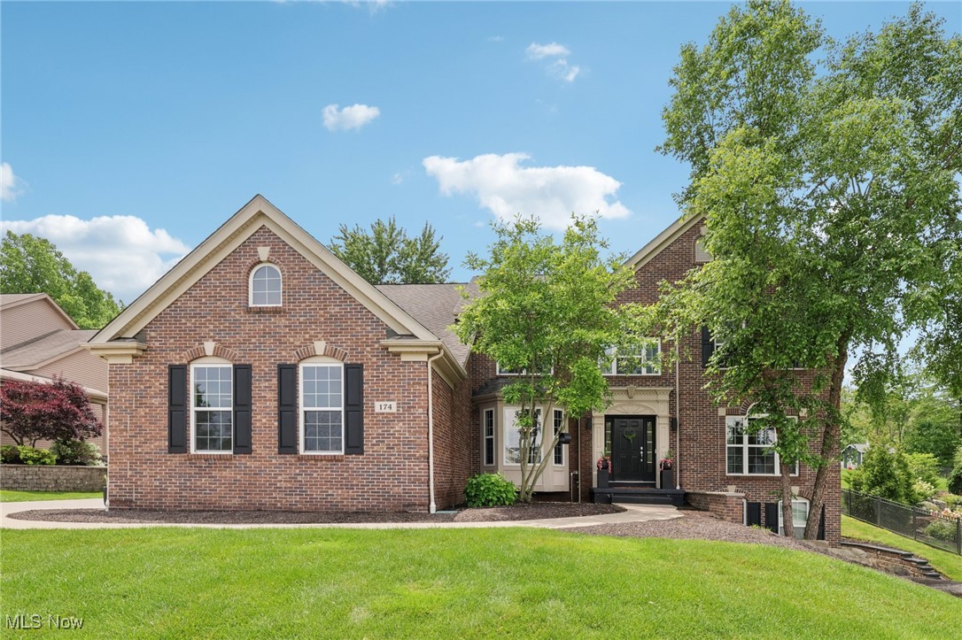 Welcome to this stately 4-bedroom, 3.5-bath colonial in the desirable Stonegate community, perfectly positioned just minutes from historic downtown Hudson. Boasting over 3,200 sq ft of living space plus a walk-out basement, this home offers a perfect blend of comfort, elegance, and functionality. Step inside to find a bright, open kitchen with granite countertops, center island, pantry, and stainless steel appliances. The kitchen flows effortlessly into the dramatic two-story great room with paladin windows, a gas fireplace, and a Juliette balcony. Formal dining, a private office, and a first-floor bonus room provide versatile spaces for work, play, and entertaining. Upstairs, the primary suite is a serene retreat with a vaulted ceiling, spa-like bath, and two walk-in closets. Three additional bedrooms and a spacious loft offer plenty of room for everyone. The walk-out lower level adds a full bath, recreation space, and storage. Enjoy warm evenings on the rear patio surrounded by lush landscaping. Just minutes to charming shops, dining, and seasonal events—this home offers the lifestyle you’ve been looking for.