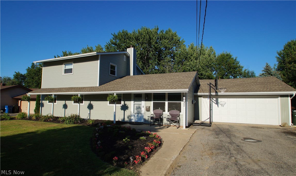 Fully remodeled terrific find in this 4 bedroom, 3 bath home located in a quiet neighborhood close to all amenities and just a walk to the lake. New roof, windows, flooring, furnace, bathrooms, kitchen with GE appliances and gas range. Perfect family floor plan offers 4 bedrooms plus an office. The living room flows into the new large kitchen, with loads of cabinet and counter space, and onto a private patio. This home also features a 2 car Garage, a partially fenced-in large backyard and a storage shed to store all your gardening and landscaping tools and free up garage space. A must see and great opportunity that won't last long.