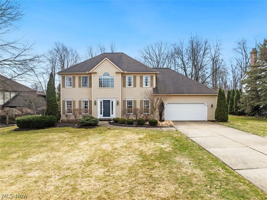 Welcome to this beautiful Colonial home offering over 3,500 sq. ft. of living space in one of Solon's desirable neighborhoods, O'Neill Landings. Featuring 4 spacious bedrooms, 2.5 baths, a 2-car garage, and finished basement this home blends elegance, comfort, and functionality. Some recent updates include new wood floors ('24), hot water tank ('24), furnace and AC ('15), roof ('15), newer epoxy floors in the garage, dishwasher ('20), stove and microwave ('24), refrigerator ('23) giving peace of mind and convenience for the new owner.  Welcome guests into the large open foyer and you'll immediately notice the impressive staircase and high ceiling. The main floor offers versatile living space including a formal living and dining room, a private office/den with double French doors and built ins, a soaring vaulted ceiling family room with wood burning fireplace (gas starter), a large eat-in kitchen with desk area and butler's pantry area. A first-floor laundry and half bath complete the main level. Upstairs, the primary suite is a true retreat with vaulted ceiling, an extra sitting area, walk-in closet with build ins, a luxurious en suite bathroom featuring dual sinks, a jetted tub, and walk-in shower. The second, third and fourth bedrooms are generously sized with large closets. The partially finished basement adds even more living space with a recreation area, a bar, and plenty of storage. Outdoors, enjoy summer evenings on the deck with a retractable awning and/or the brick patio and beautiful landscaping. The yard has an irrigation system to help with those hot months in the summer. With its ideal location, spacious floor plan, and exceptional neighborhood, this home is truly a must-see. Schedule your private showing today!