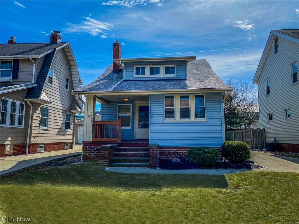 A classic Cleveland bungalow within walking distance to the popular Kamms Corner shops, entertainment, and restaurants! A large front porch and fenced in back yard area to enjoy the quiet street. The inside charm is accented by a mix of hardwood and carpet with large white baseboards to tie in the modern feel. The living area includes a wood burning fire place matched with built in bookshelves on either side. An abundance of natural light enters through the sunroom off the main living area. Larger kitchen with plenty of counter space for prep and cooking on the gas oven. The roof was replaced in 2020 on both the house and the 1+ car detached garage. The first floor is completed with a bedroom or can be used as a spacious office or den. Master bedroom has a separate dressing area and plenty of closet space. Ceramic tile bath with updated fixtures. Come make this your home today. Hurry because this beauty will not last!