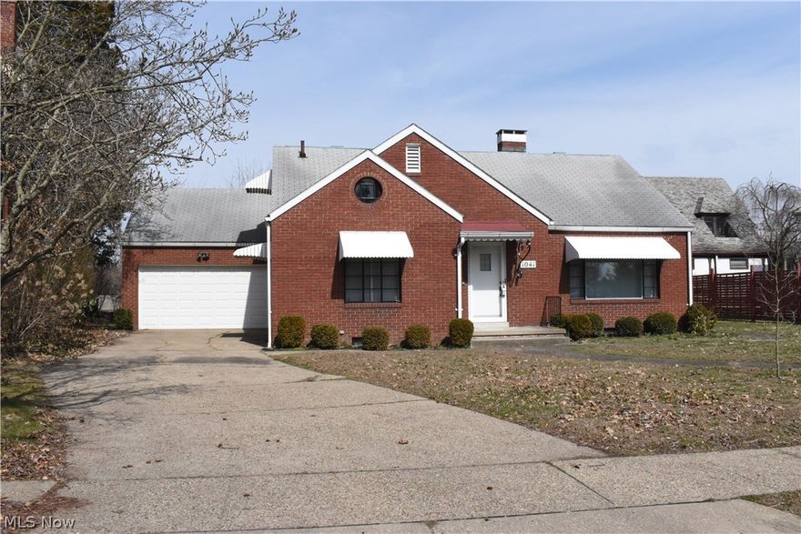 Very convenient to I70 East or West.  All brick story and one half.  Two full baths one on main and second floor. Main floor bedroom is spacious with nice big closet.  Lots of storage cabinets in baths.  Full bath upstairs with two nice size bedrooms. Big closets in both.   Fireplace. Sun porch. Formal dining area.  Eat in kitchen.  Attached garage. McIntire historic neighborhood.